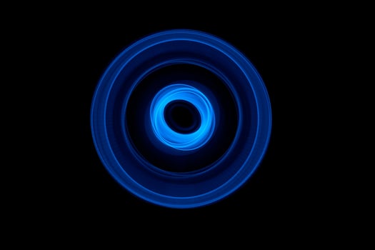 Glowing abstract curved blue lines photo