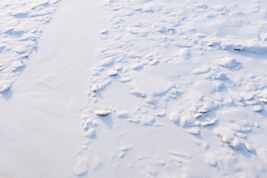 pattern of clean white textured snow on a cold winter day photo