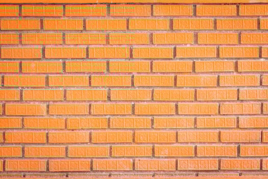Red brick wall texture background with beautiful texture on the bricks photo