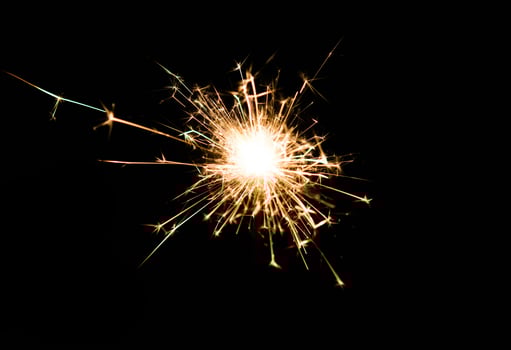 Christmas and newyear party sparkler on black photo