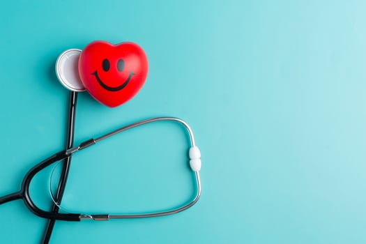 red heart and stethoscope photo