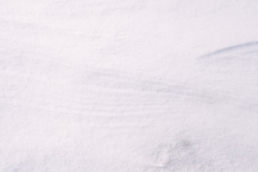 textured snowdrift closeup, clean white snow texture photo
