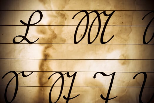 Vintage old Latin Alphabets on Paper Background photo