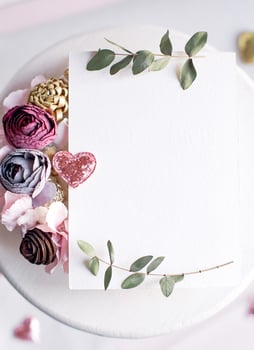 Background with copy space blank on white table with glitter heart, photo