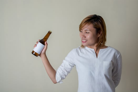 Wellness beauty woman holding a bottle of juice in her hand  girl. photo