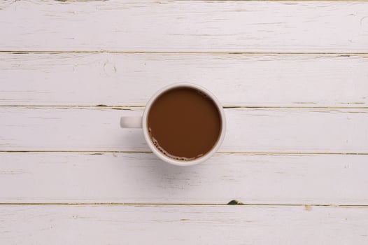 coffee mug on wooden background photo