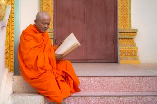 Monks in Thailand are reading books photo