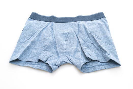 Blue men's underwear isolated on white background photo