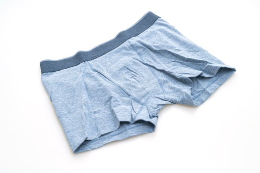 Blue men's underwear isolated on white background photo