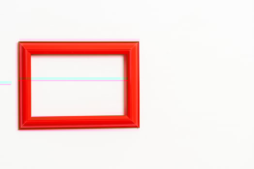 Empty picture frame on white wall background with copy space photo