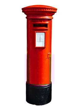 Red post box isolated on white. photo