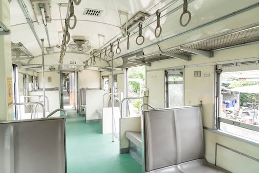 Inside of a last century-old train passenger carriage photo