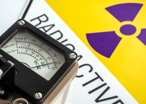 Radiation measurement with Hand-held radiation survey meter photo