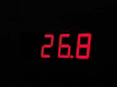 Digital LCD display of thermometer showing hot temperature in Ce photo