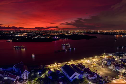 Bird's eye view of Samut Prakan, Thailand. Sunset  orange sky. photo