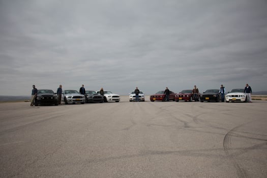 Cars on the race track and on the roads of the desert photo