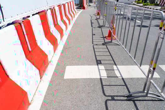Road is closed with fence because of construction photo