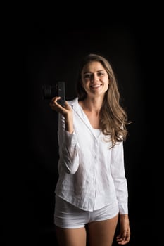 Fashion portrait of young woman photographer with camera photo