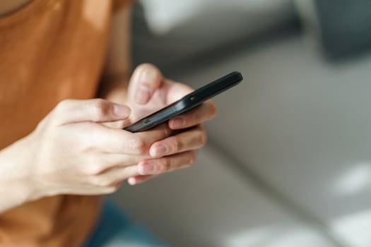 Young woman using smartphone typing, chatting conversation. technology photo