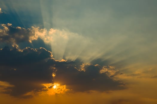 Beautiful sky with clouds and sun rays photo