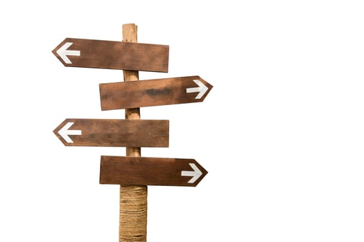 wooden arrow sign post isolated on white background with clipping path photo