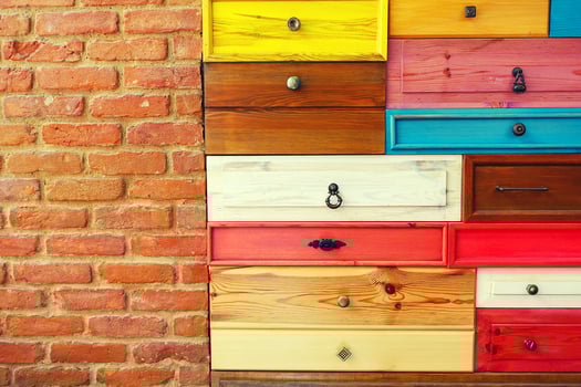 Colorful Wooden Drawer and Brick Wall photo