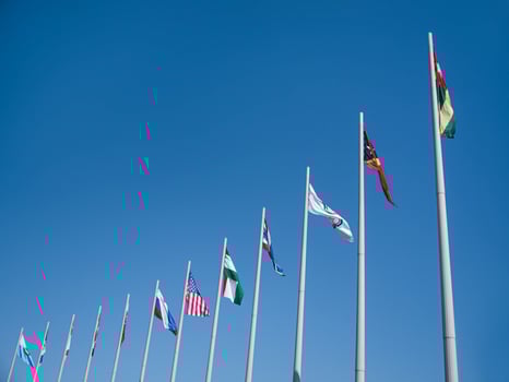 Adler city, Russia - August 2019, Flags of the countries of the world on flagpoles in Olympic Park photo