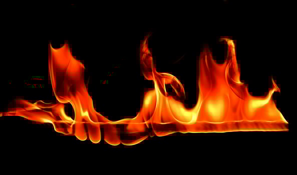 Fire flame on blackground photo