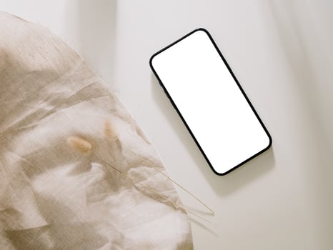 Smartphone mockup, Phone with blank screen template. Flat lay photo