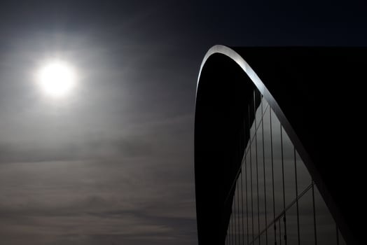 Arch Building with sun photo