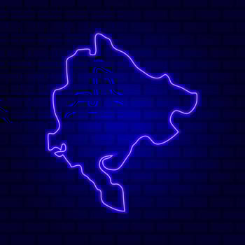 Montenegro glowing neon sign on brick wall background photo