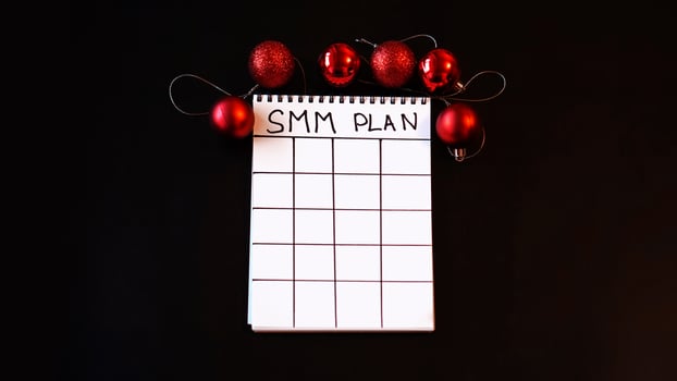 Freelance project. SMM plan blank. White sheet on a black background photo