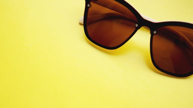 studio shot of sunglasses. summer is coming concept photo