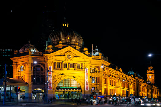Flinders street railway station in central Melbourne city Australia at night photo