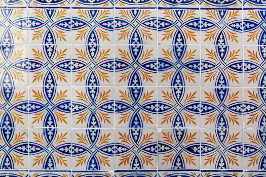 Fragment of a tiled house wall photo