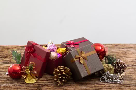 present box with color ribbon on white background photo