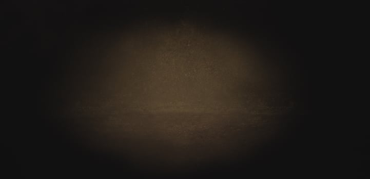 Light spot on cement dark background photo