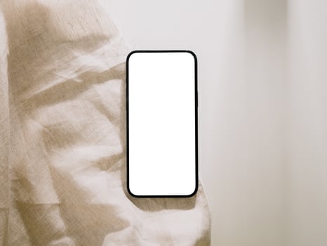 Smartphone mockup with phone with blank screen template, flat lay photo