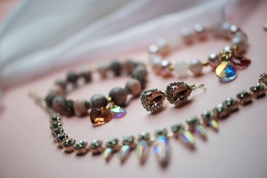 Close-up details of necklace and earrings with swarovski crystal photo