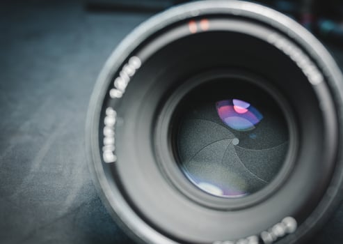 Closeup of the aperture blades of a movie lens. photo