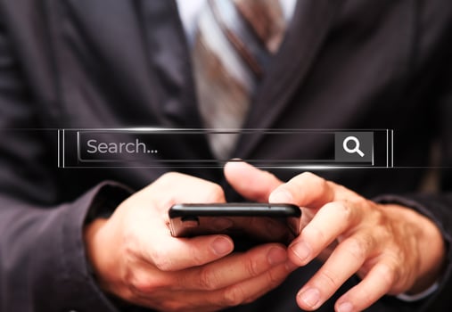 Business hand using smartphone with data search technology photo