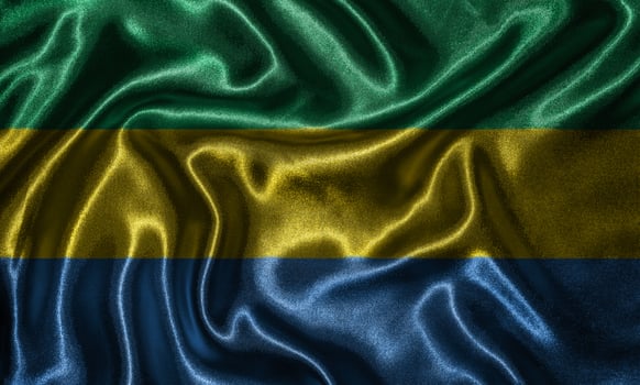 Wallpaper by Gabon flag and waving flag by fabric. photo