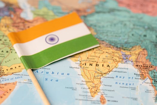 India flag on world map background. photo