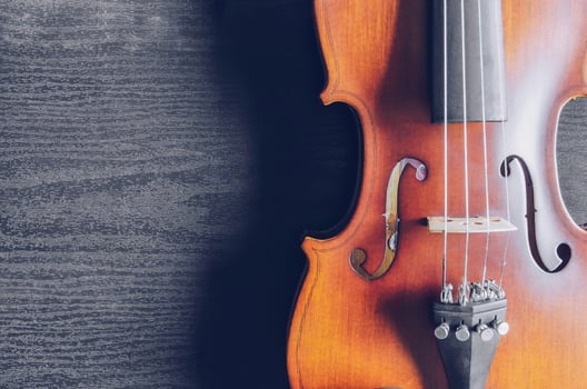 The violin on table, Classic musical instrument used in the orchestra. photo