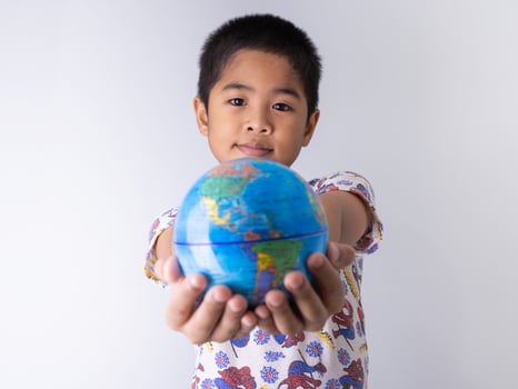 Boy holding a globe photo