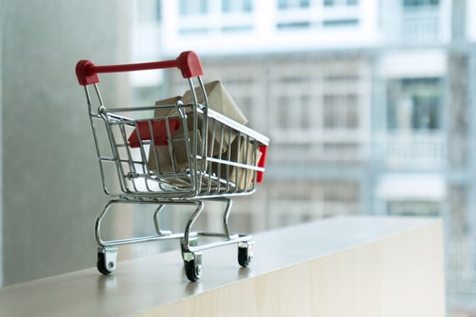 Shopping cart full of cardboard Paper boxes photo