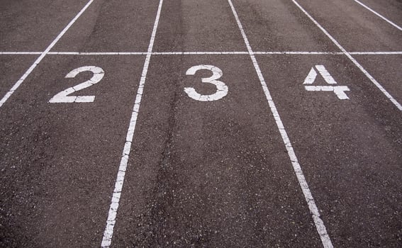 Numbers on a running track photo