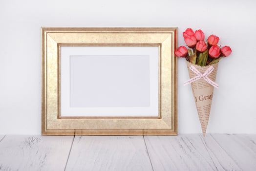 Golden frame with flowers photo