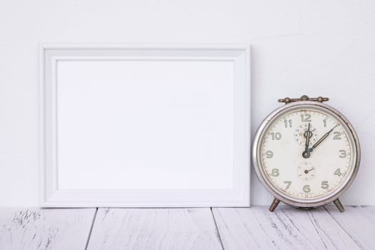 White frame with clock photo