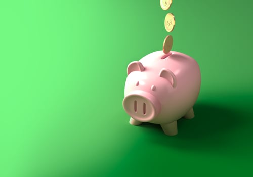 Piggy bank and gold coins photo
